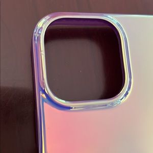 Loopy stop the stop iPhone 13max case in violet quartz iridescent edition.